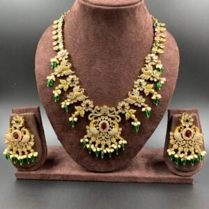 Gold-toned peacock antique necklace with red, green stones and pearls