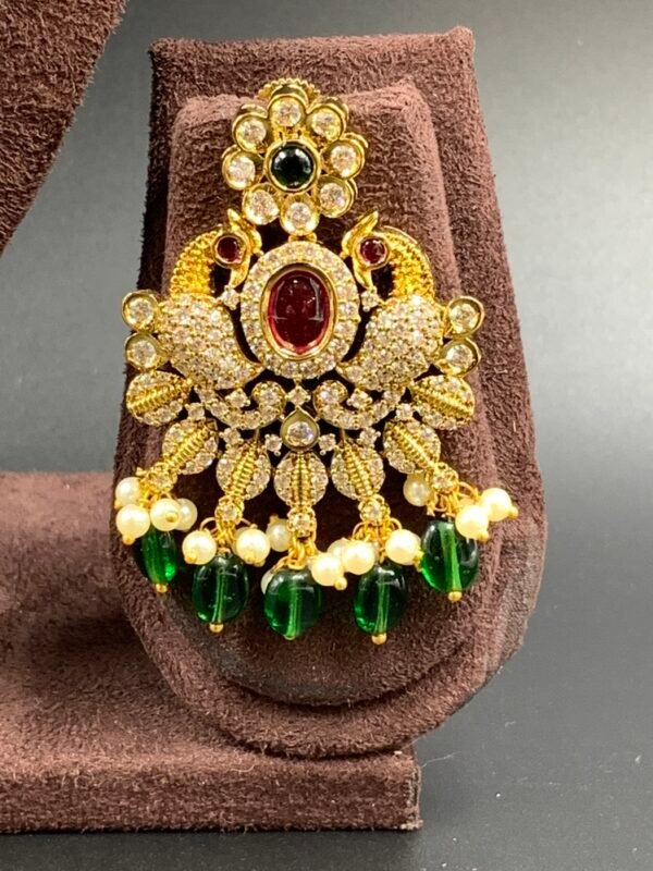Gold-toned peacock antique necklace with red, green stones and pearls