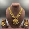 Gold toned antique jewelry set with pearl beads and earrings