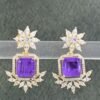 Purple stone earrings with floral gold-toned design