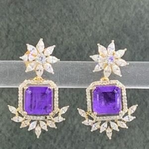 Purple stone earrings with floral gold-toned design