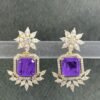Purple stone earrings with floral gold-toned design