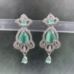Elegant dangle earrings with aquamarine stones and cubic zirconia in ornate silver setting