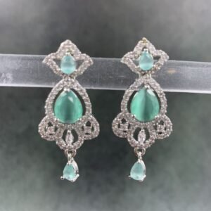 Elegant dangle earrings with aquamarine stones and cubic zirconia in ornate silver setting