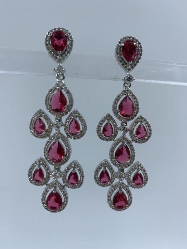 Elegant chandelier earrings with cascading fuchsia pear-shaped gemstones and crystal halo settings