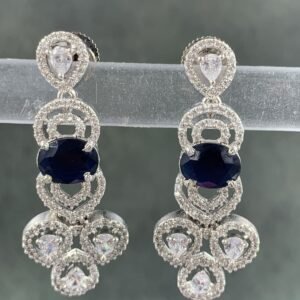 Blue stone earrings with silver-toned metal and white teardrop stones