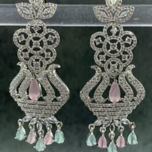 Ornate pink chandelier earrings with floral design and teardrop stones