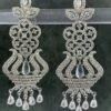 Elegant white chandelier earrings featuring white gemstones with floral accents—perfect for Indian festive and ethnic wear.
