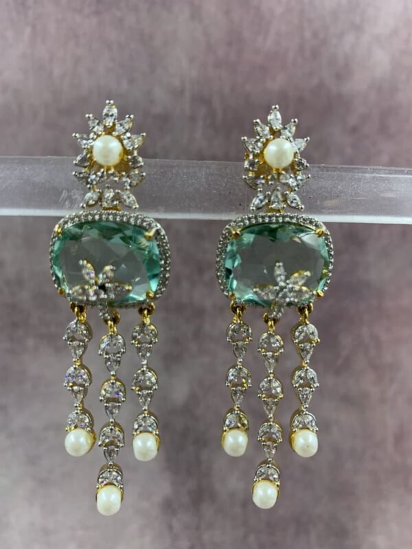 Statement drop earrings with pearl drops, mint green gemstone, and floral stud