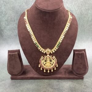 South Indian temple necklace featuring deity pendant with gold beads