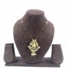 Gold-toned traditional pendant necklace with green beads and ornate central pendant