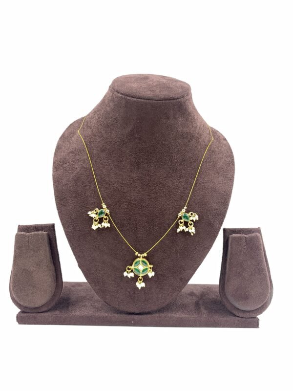 Invisible chain necklace with red floral pendant